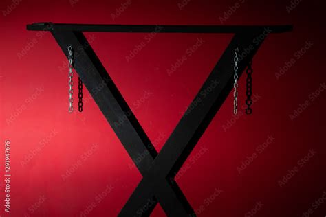 Sm Cross Or Andreaskreuz Is Used In The Bdsm Scene On Red Background