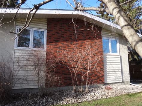 The best brick updates on the internet. Design help needed to update ugly red brick exterior
