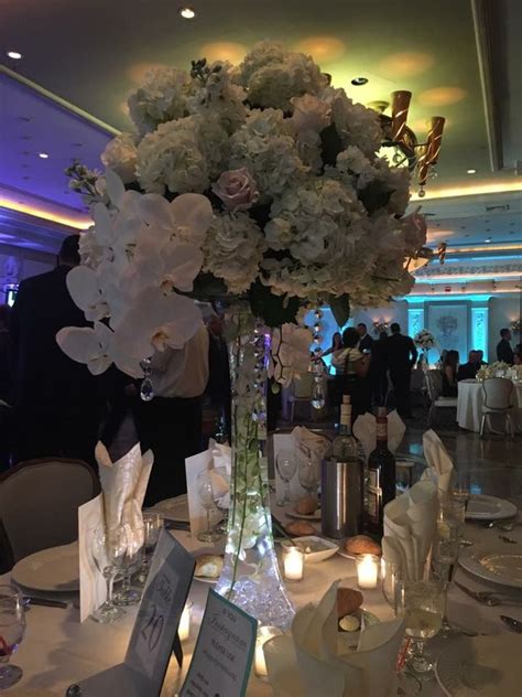 Do blue hydrangeas hold up for wedding bouquets. Roses, hydrangeas, and hanging orchids | Hanging orchids ...