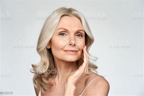 Beautiful Gorgeous 50s Mid Aged Mature Woman Looking At Camera Isolated