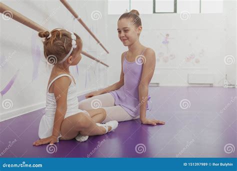 Charming Two Young Ballerinas Practicing At Ballet Class Stock Image