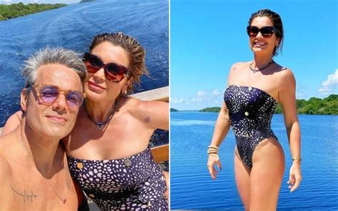 Flávia Alessandra E Otaviano Costa Passeiam De Barco E Nadam Em Rio Na