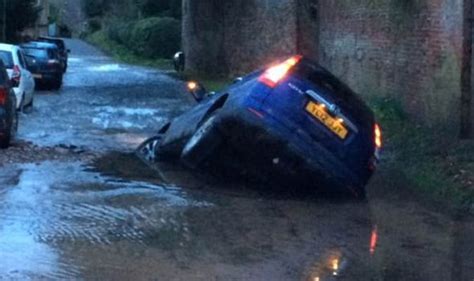 Woman Terrified As Car Sucked Into Underwater Sinkhole As Thousands