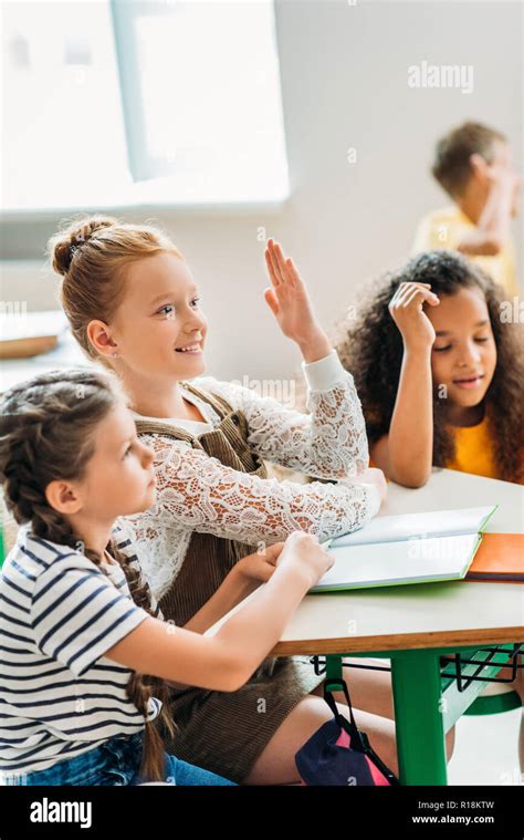 Kids Raising Hands Classroom Hi Res Stock Photography And Images Alamy