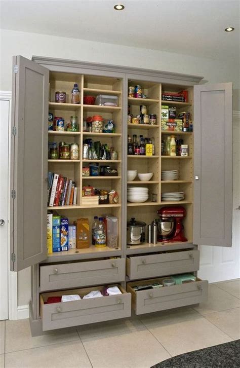 An Organized Pantry With Two Doors Open And Shelves Full Of Food