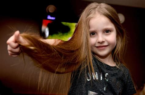 Mid Wales Girl Cuts Off 15 Inches Of Hair For Children Suffering With