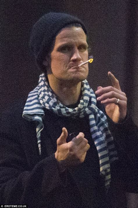 The Crown S Matt Smith Smokes Suspicious Looking Cigarette Outside A