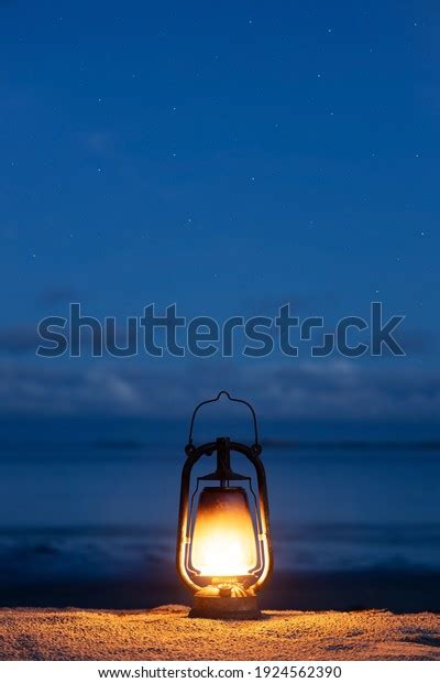 Oil Lamp On Beach Night Vertical Stock Photo Edit Now