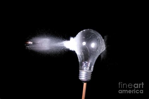 Bullet Hitting A Clear Lightbulb Photograph By Ted Kinsman Pixels