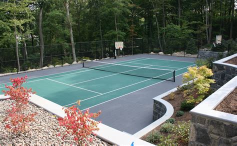 Playing tennis is a favorite pastime for residents on the. The Advantages of a Backyard Court | Long Island Tennis ...