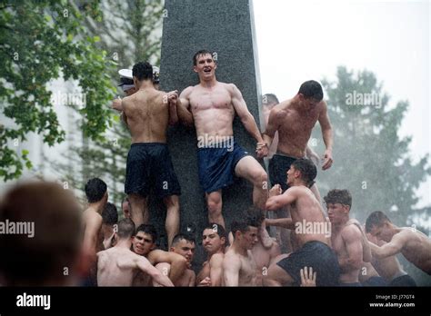 U S Naval Academy Plebes Form A Human Pyramid Around The Greased Herndon Monument As They Try To