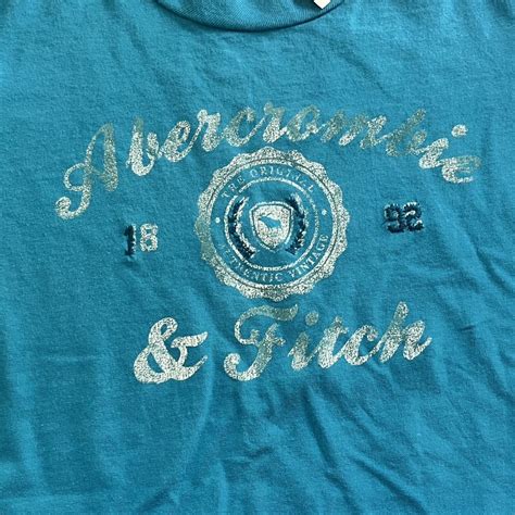 abercrombie and fitch women s blue and white t shirt depop