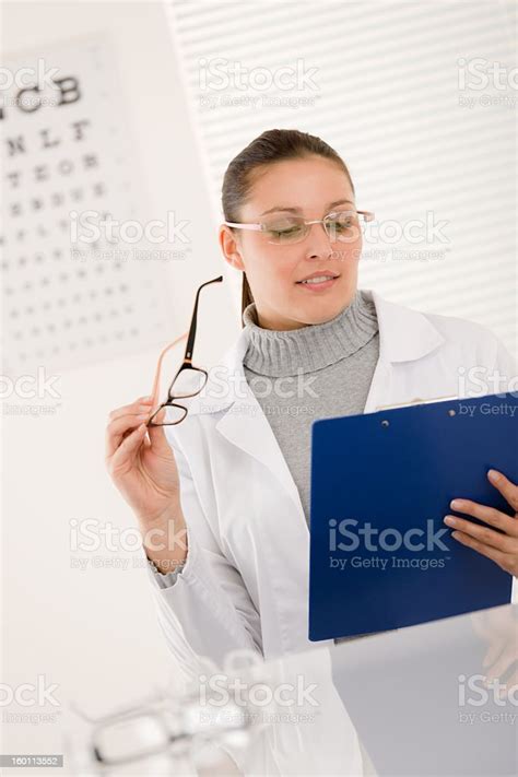 Optician Doctor Woman With Glasses And Eye Chart Stock Photo Download