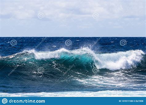 Blue Green Wave Breaking On Hawaii`s Big Island Foam On Top Deep Blue