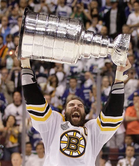 Boston Bruins Zdeno Chara Lifting The Stanley Cup After Defeating The