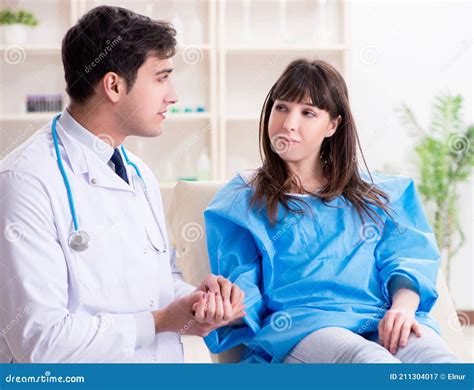 Male Doctor Checking Up Female Patient In Hospital Stock Image Image Of Cardiology