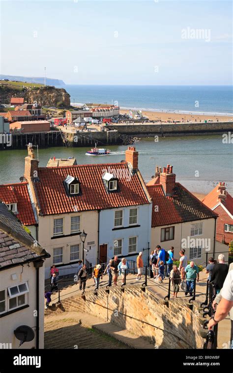 Tourists Climbing The 199 Steps Whitby North Yorkshire England Uk