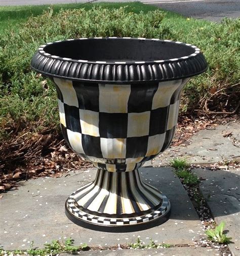 Remove most of the potting mix from your pot. Urn planter hand painted black and white by ...