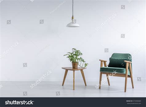 A green armchair can be combined with the widest range of interiors. White Room Green Armchair Small Table 스톡 사진(지금 편집 ...