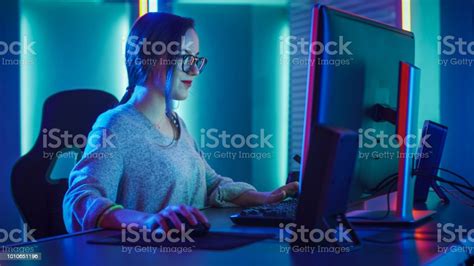 Beautiful Professional Gamer Girl Sitting Down To Play In Firstperson
