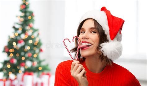 Woman In Santa Hat Licks Candy Canes On Christmas Stock Image Image Of Lick Brunette 163623753