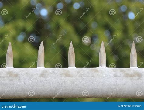 Metal Spikes On Top Of Security Fence Stock Photo Image Of Tipped