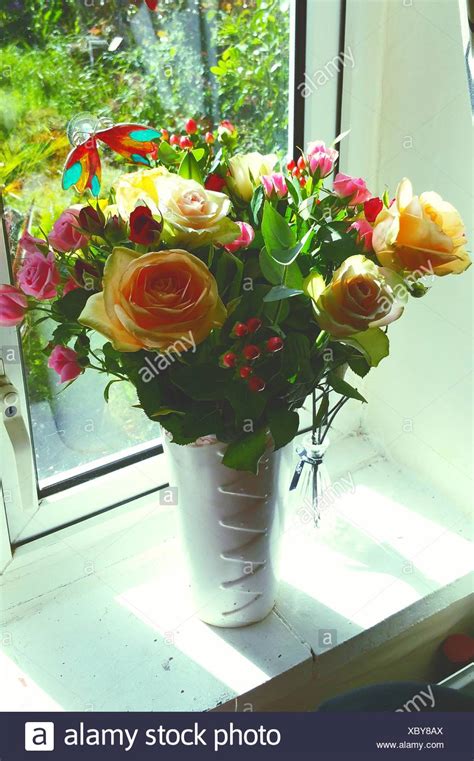 Flowers In Vase On Window Sill High Resolution Stock Photography And