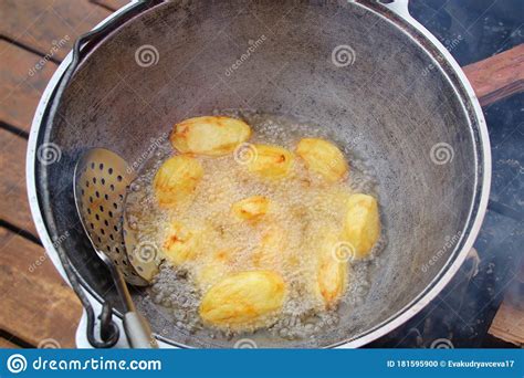 Round Potatoes Fried In A Lot Of Oil Stock Photo Image Of Fresh