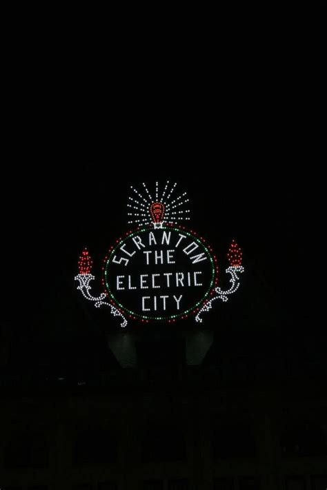 The Newly Refurbished Electric City Sign Lights Up Courthouse Square In