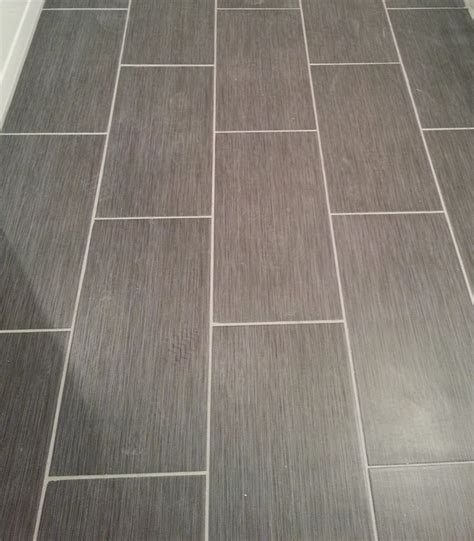 Up to 70% savings compared to other home improvement & flooring retailers! Home Depot Metro Gris 12x24 tile in my bathroom ...