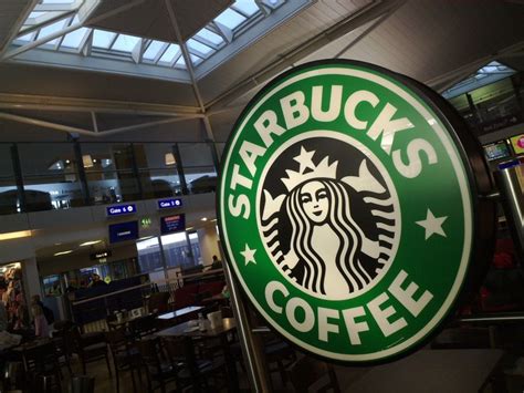 Starbucks Coffee Coffee Shop Logo Wall Firm Wallpaper