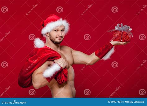 De Sexy Kerstman Heeft Verrassing Voor U Stock Foto Image Of Zwart
