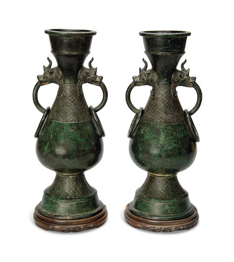 A Pair Of Chinese Patinated Bronze Vases Yuan Dynasty 13th Century