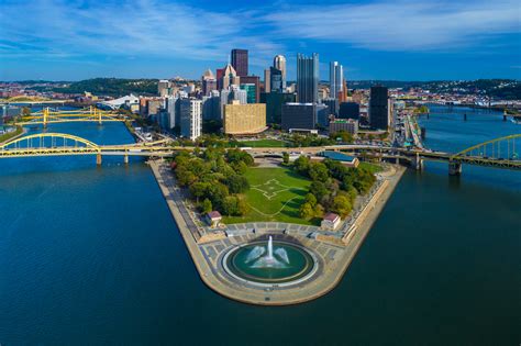 Pittsburgh Skyline Aerial With Fountain Two Rivers And Bridges City