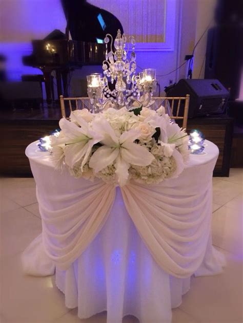 Wedding flowers for bride and groom. Sweetheart table | Wedding cake table, Wedding table ...