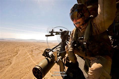 Us Marine Corps Uh 1y Huey Helicopter Door Gunner Scans The Horizon