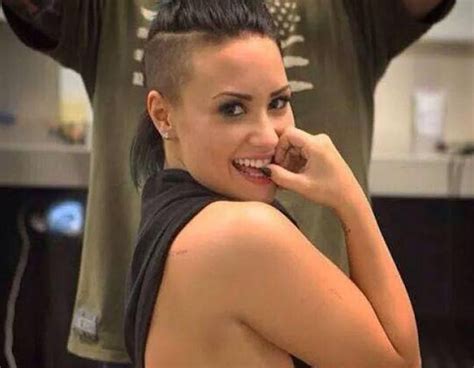 Demi Lovato Serves Up Major Side Boob While Showing Off New Tattoo—find