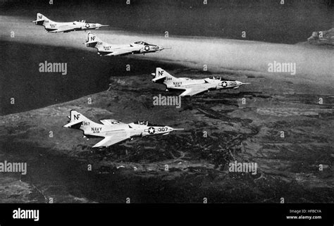 F9f 8 Cougars Va 56 In Flight 1957 Stock Photo Alamy