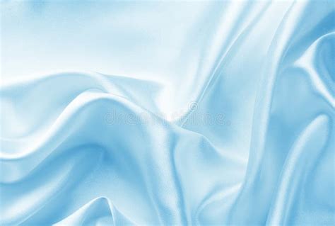 Blue Silk Satin Fabric With Large Folds Delicate Background Stock