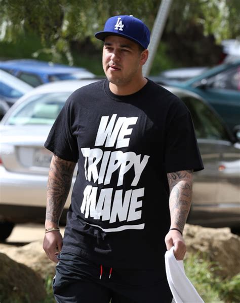 rob kardashian accused of stealing pics after being photograhed shirtless