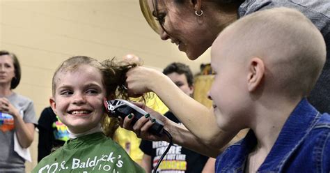 80 Students Shave Heads To Support Classmate With Cancer Returning To