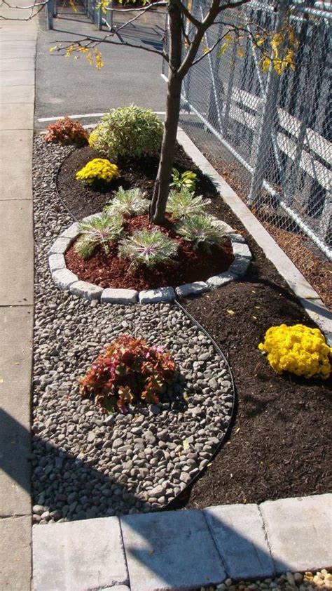 Garden centers, nurseries, landscaping and lawn care businesses, excavating companies, hardware stores tree mulch mulch around trees davey tree pergola pictures mulch landscaping outdoor garden furniture water conservation pergola. Bark mulch and rocks for landscaping | Small front yard ...