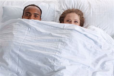 Couple Under Sheets Stock Photos Pictures And Royalty Free Images Istock