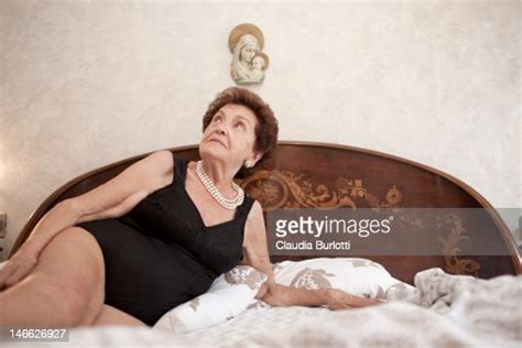 Old Lady In Bodysuit Laying In Bed Photo Getty Images