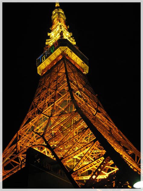 Vacation On A Budget Nighttime View Of Tokyo Tower Day