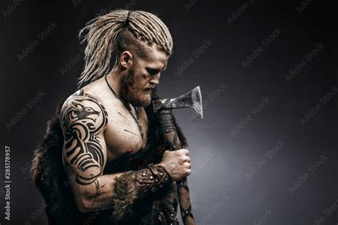 Medieval Warrior Berserk Viking With Tattoo On Skin Red Beard And