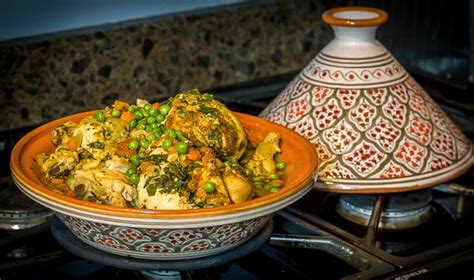 While the tagine cooks, pull the meat from the chicken, discarding the skin and bones. Moroccan Chicken Tagine Recipe - Analida's Ethnic Spoon