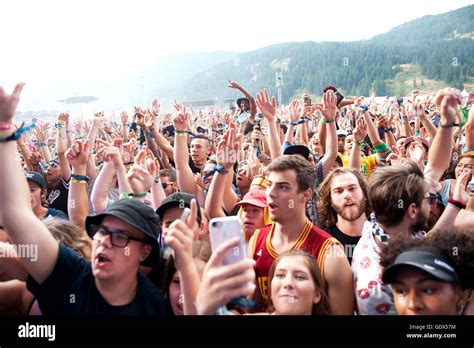 Huge Crowds The Outdoor Rock Concerts Fans Cheer In The Rain At The