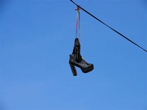 Check spelling or type a new query. The mystery of sneakers dangling on the power lines of New ...