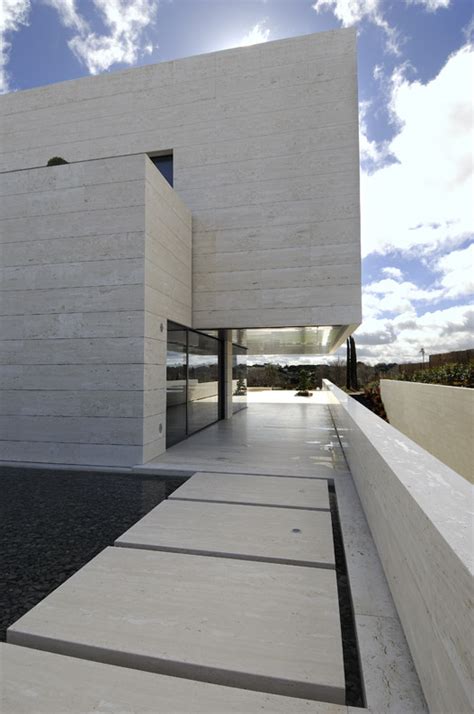 Amazing Travertine House By A Cero Architecture Firm With Water Features